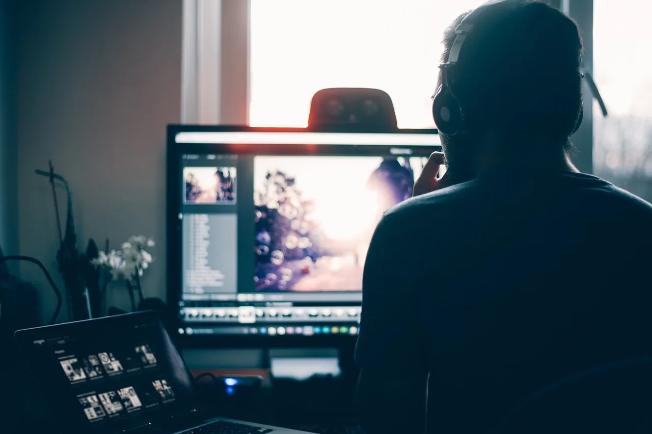 people, man, laptop, mac, editing, post processed, monitor, office, work, headset, blue computer, blue office, blue laptop, blue work, blue email, headset, headset, headset, headset, headset